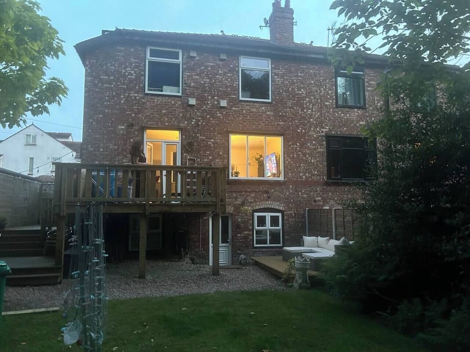 Rear view to entrance and garden 