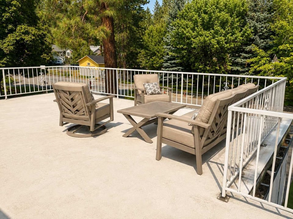 Private rooftop deck with outdoor seating—perfect for morning coffee or relaxing together in the evening.