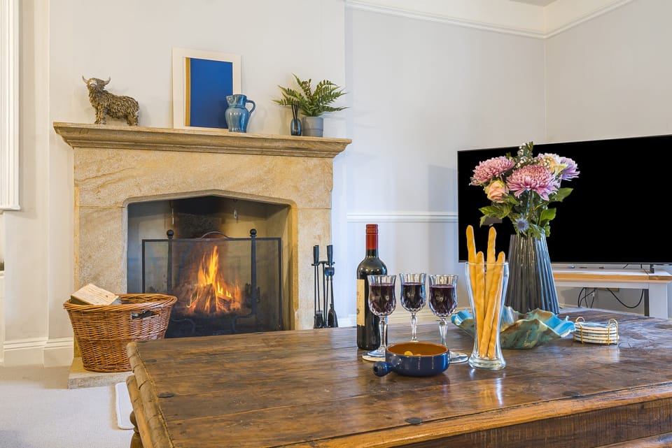 Beech House, Evershot: Enjoy cosy evenings in front of the open fire