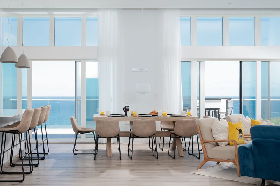 26 Cliff Edge Penthouse, Newquay: Large patio doors open onto your expansive sea-facing terrace, seamlessly blending indoor and outdoor living