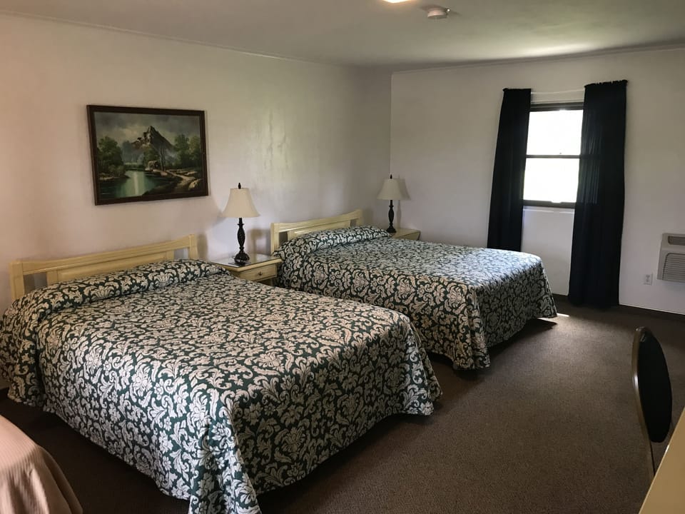 Deluxe Room, 2 Queen Beds | Desk, WiFi (free), bed sheets