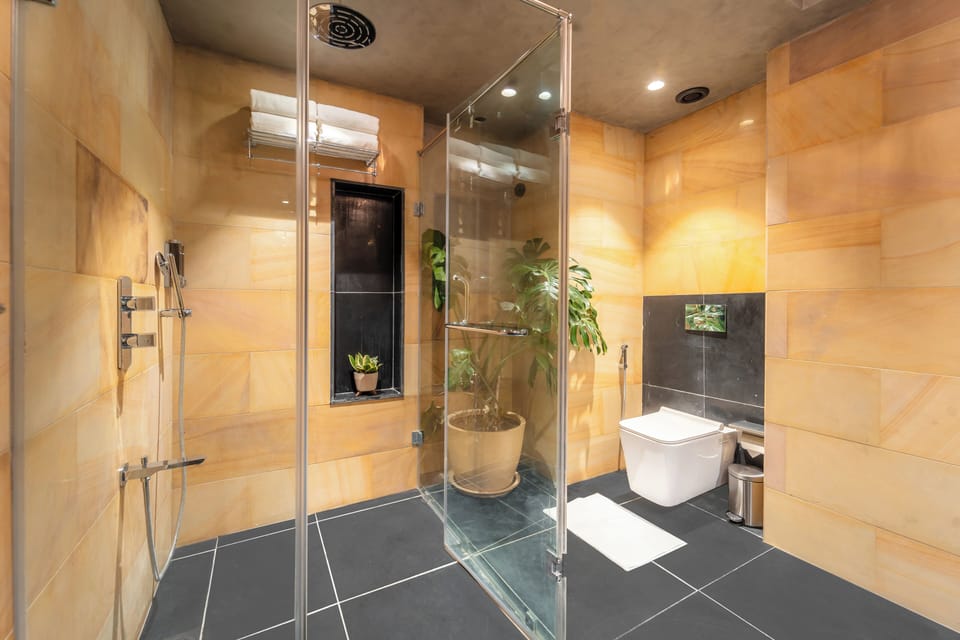 Executive Suite, Balcony, City View | Bathroom | Slippers, bidet