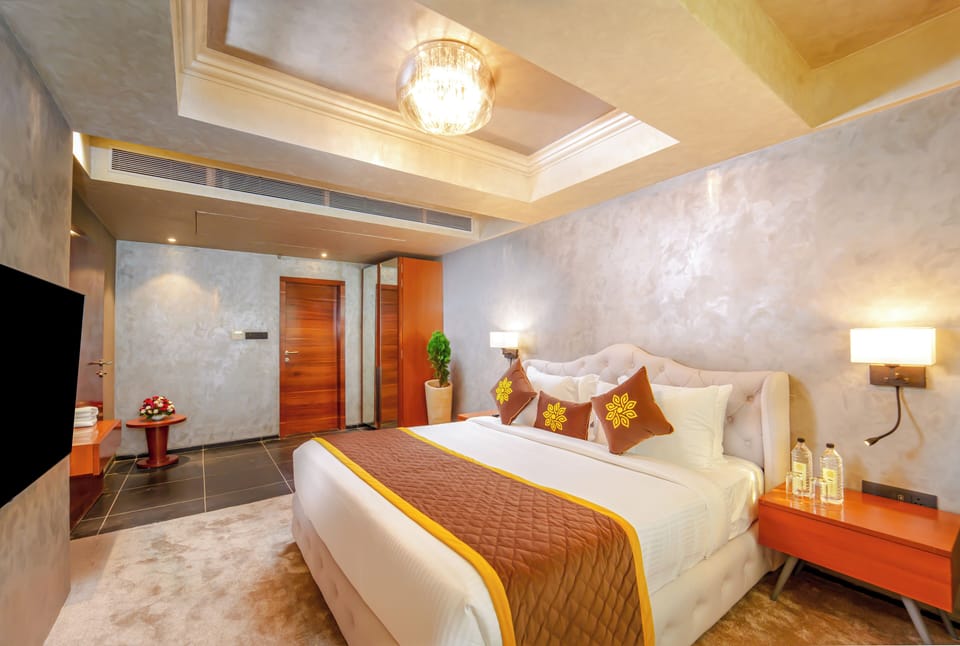 Executive Suite, Balcony, City View | In-room safe, soundproofing, iron/ironing board, WiFi (free)