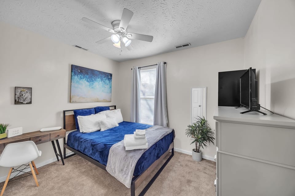Desk and TV in Bedroom 2