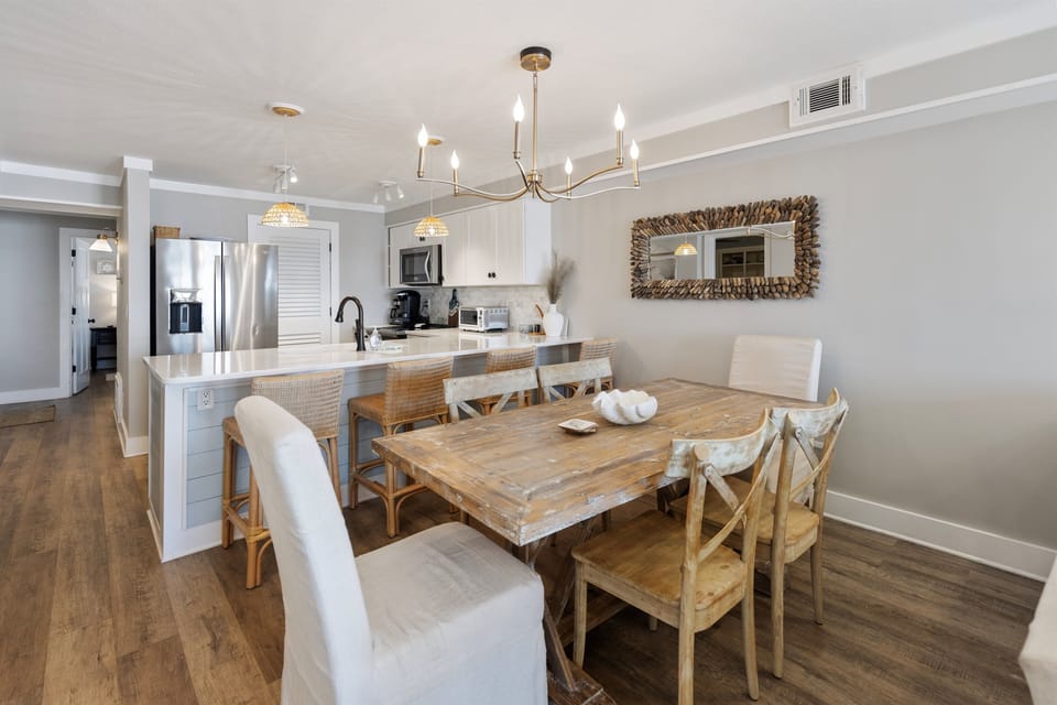 Gather around your spacious dining table for memorable meals while the open kitchen invites culinary adventures together.