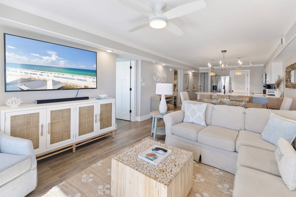 Sink into this coastal living room where soft fabrics and ocean-inspired decor create your perfect retreat for relaxing after beach days.