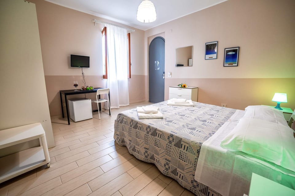 Double or Twin Room, Private Bathroom, Partial Sea View | Desk