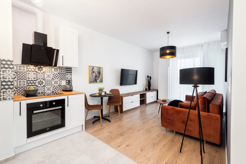 Superior Apartment, Balcony, City View | Private kitchenette | Full-size fridge, oven, stovetop, dishwasher