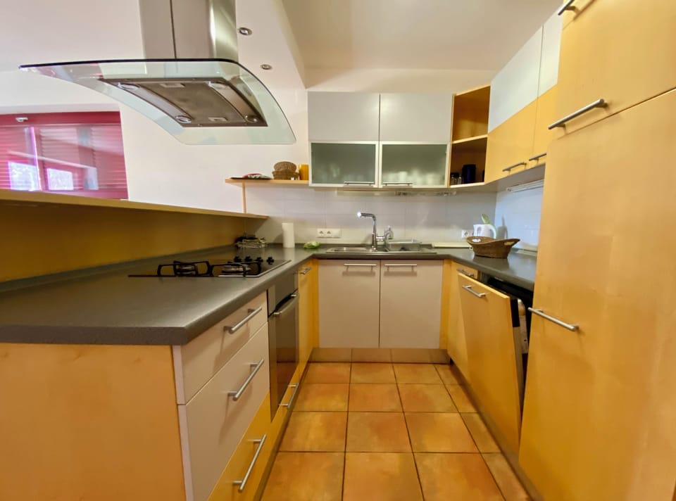 Kitchen with a stove and stove top