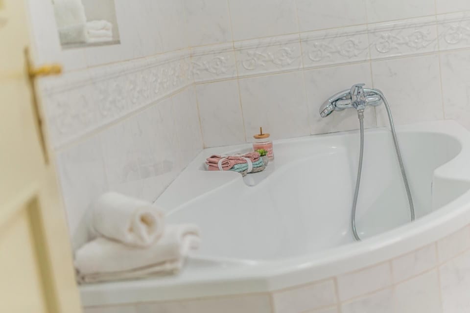 Apartment | Bathroom | Separate tub and shower, deep soaking tub, hair dryer, towels