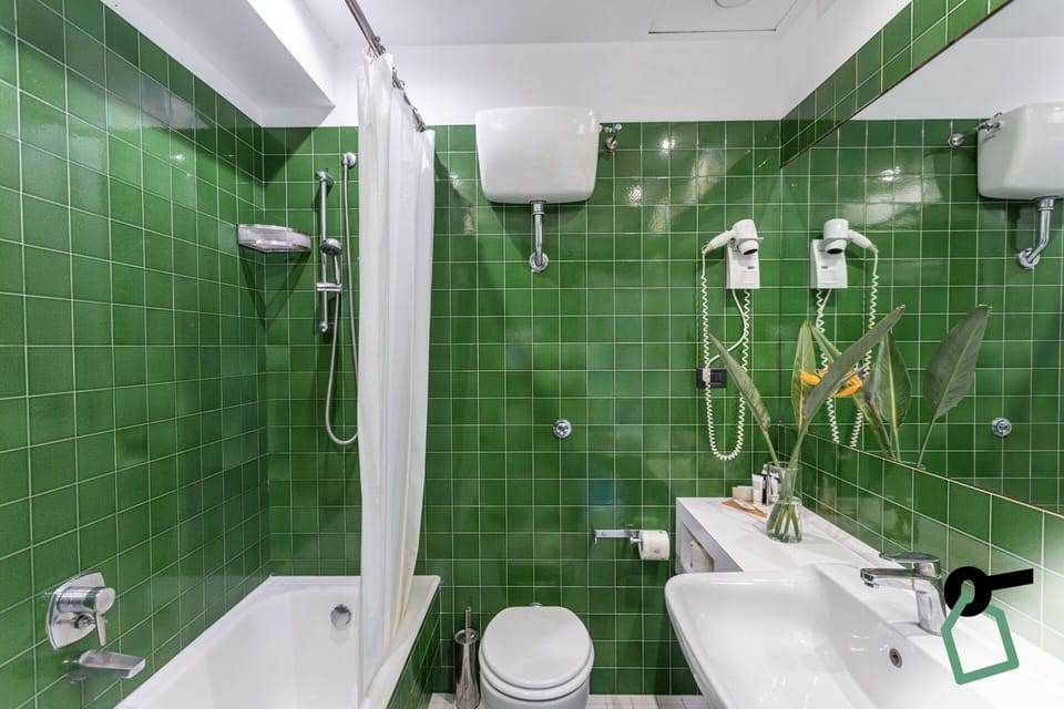 Triple Room, Balcony | Bathroom | Shower, free toiletries, hair dryer, towels
