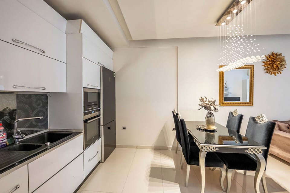 Apartment, 2 Bedrooms, Balcony | Private kitchen | Fridge, oven, stovetop, electric kettle