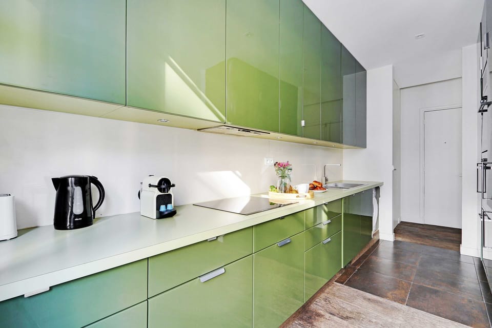 Comfort Apartment | Living area | 55-inch flat-screen TV with cable channels