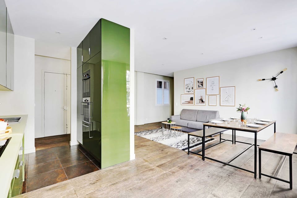 Comfort Apartment | Living area | 55-inch flat-screen TV with cable channels