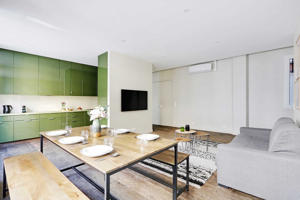 Comfort Apartment | Living area | 55-inch flat-screen TV with cable channels