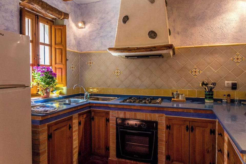 Fully equiped open kitchen on the ground floor.