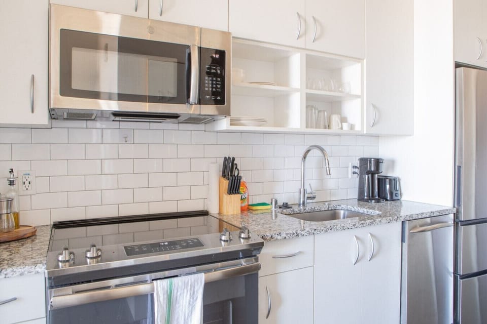 Chef-ready kitchen featuring modern appliances and all the essentials for a home-cooked meal