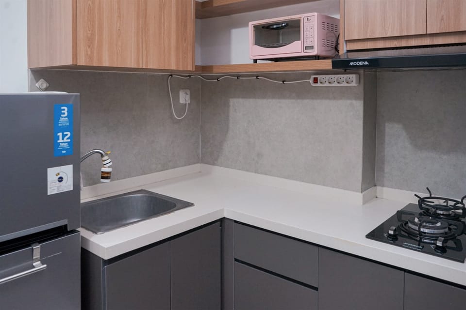Standard Apartment | Private kitchen | Fridge, stovetop