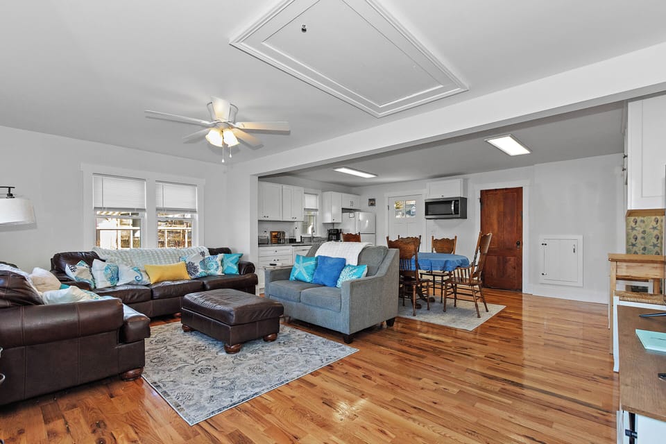 Open living room, dining room, and kitchen area