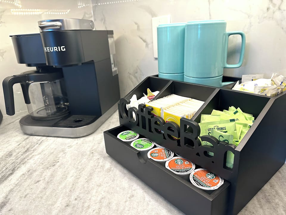 Coffee, tea, sweeteners and creamers are provided.
