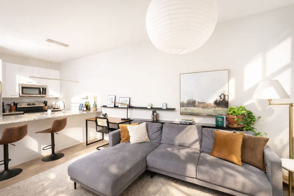 Bright, airy, and inviting. The open-concept layout is perfect for relaxing or catching up on your favorite shows