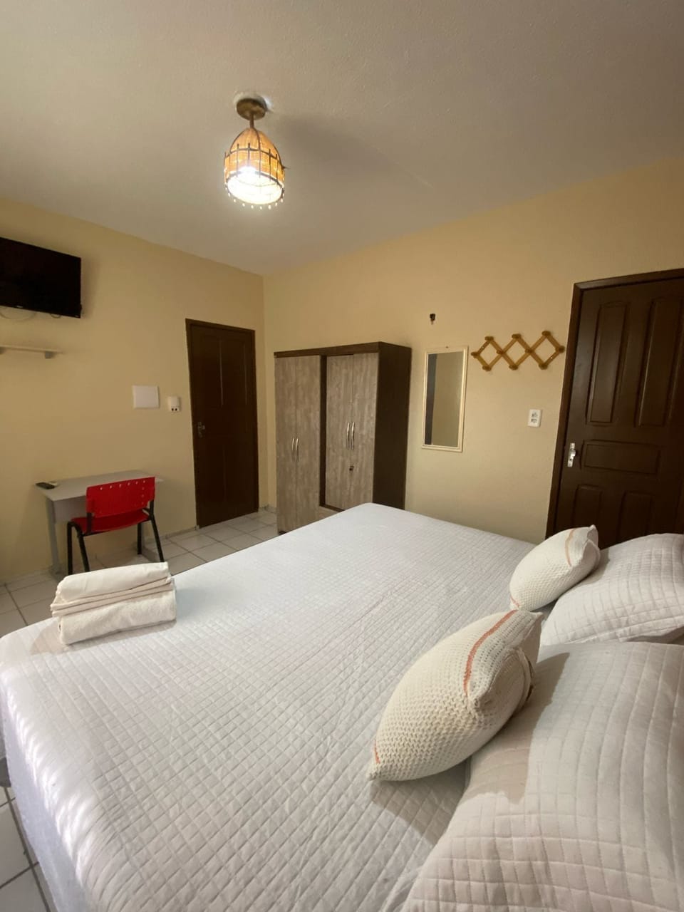 Comfort Room | Blackout drapes, iron/ironing board, bed sheets