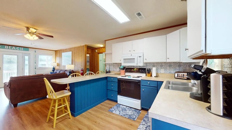 kitchen with 4 bar stools