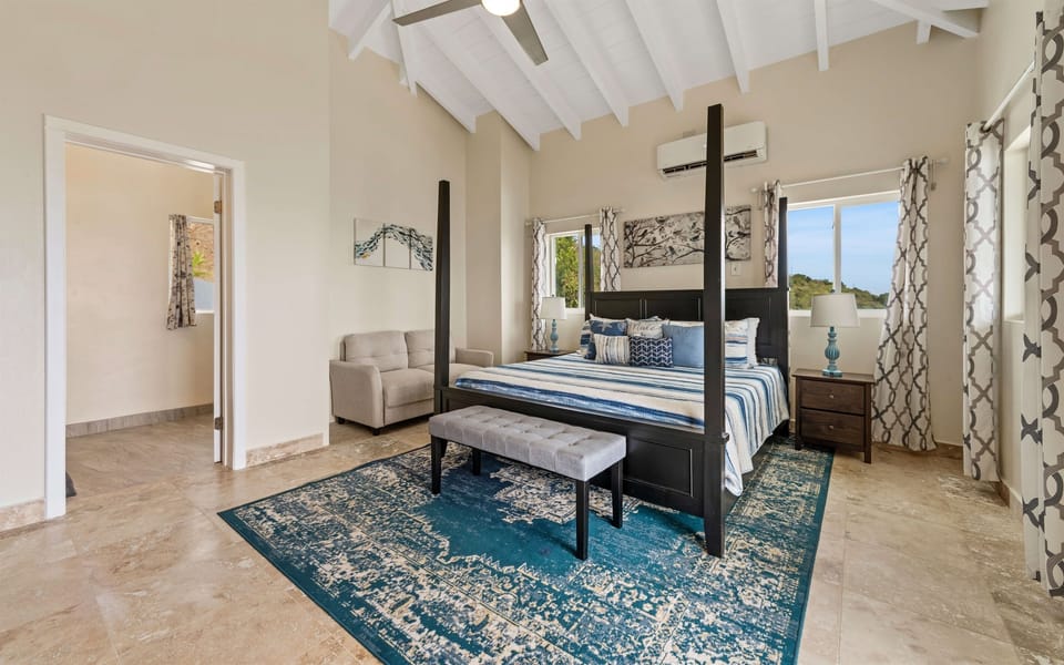 Spacious and calming, the main floor suite invites restful nights.