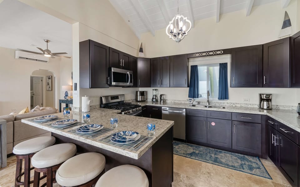 A chef's delight with granite countertops and ample workspace.
