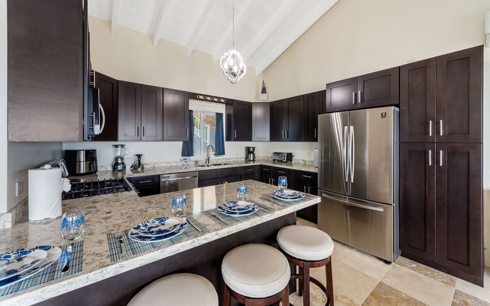 Cook up something special in the fully equipped kitchen with modern appliances.