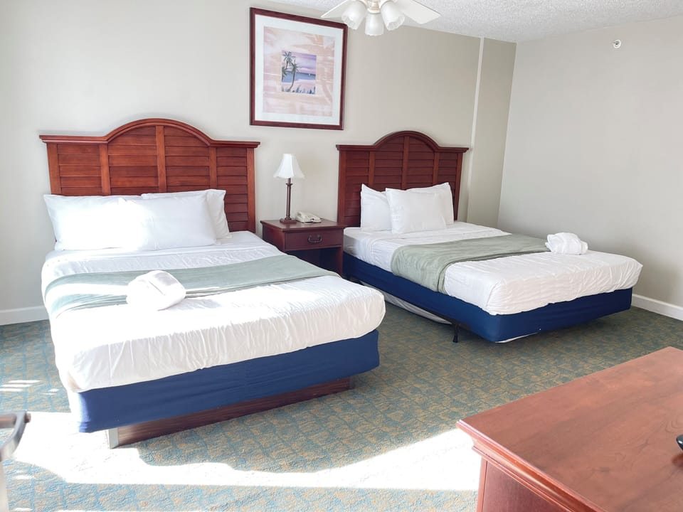 Comfortable Room with Two Separate Beds and Tranquil Styling
