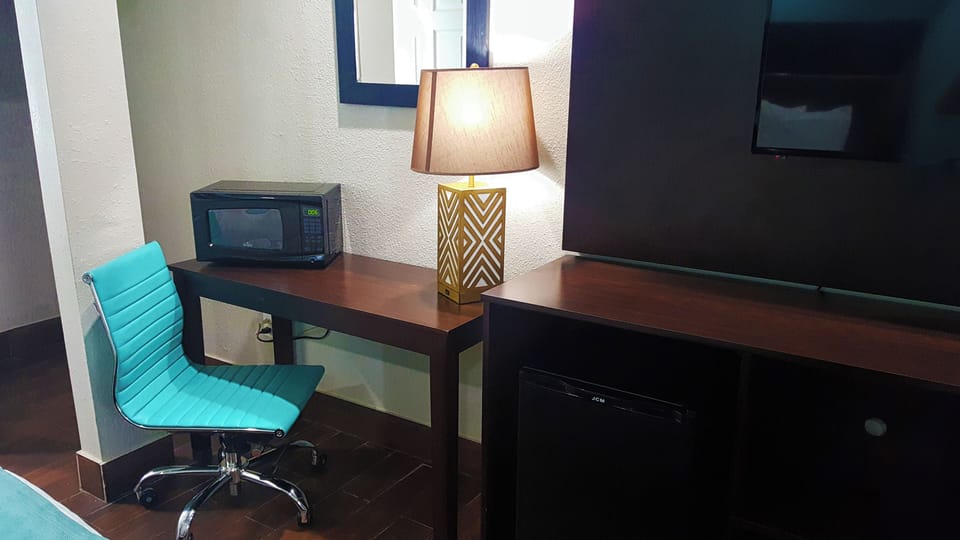 Premium bedding, pillowtop beds, desk, laptop workspace