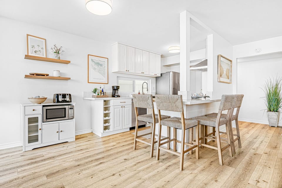 The kitchen opens out to the living area, making meal prep a social affair!
                