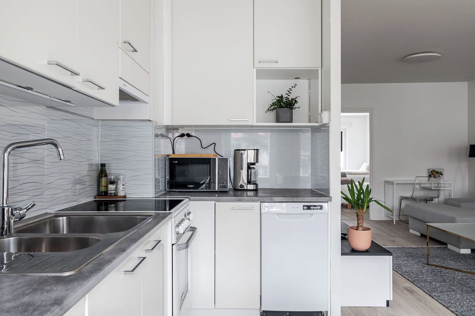 Comfort Apartment, City View | Private kitchen | Coffee/tea maker, electric kettle, toaster, highchair