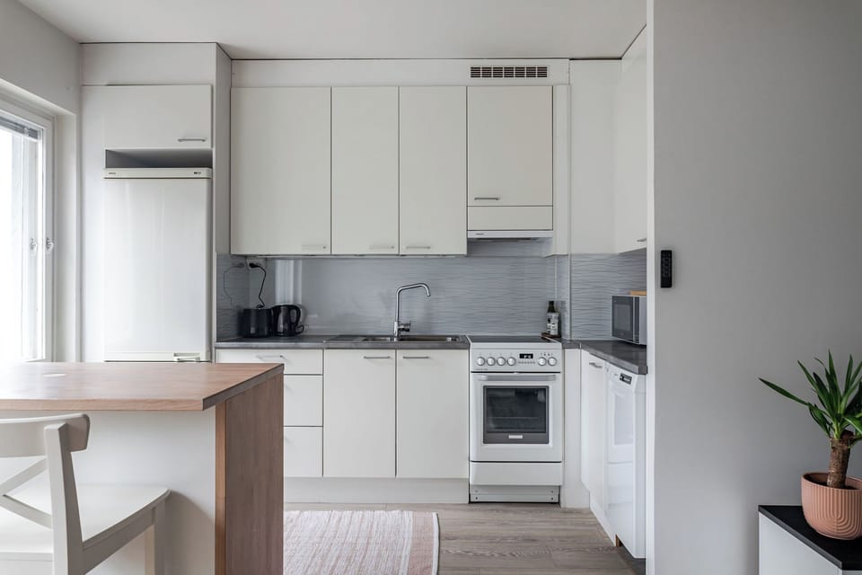 Comfort Apartment, City View | Private kitchen | Coffee/tea maker, electric kettle, toaster, highchair
