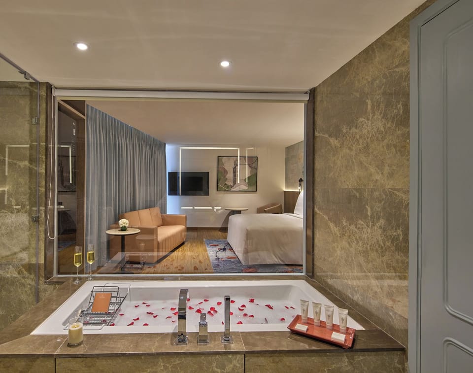 Prestige Room Smart Laundry, Espresso Machine and Non-Alcoholic Mini Bar | Bathroom | Free toiletries, hair dryer, bathrobes, slippers