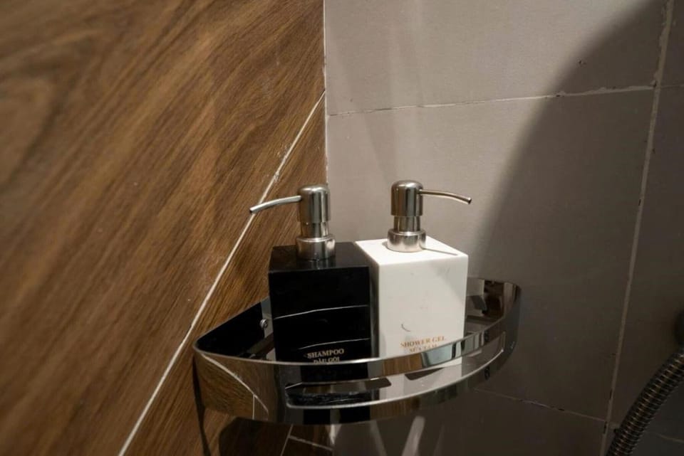 Shower, free toiletries, hair dryer, slippers