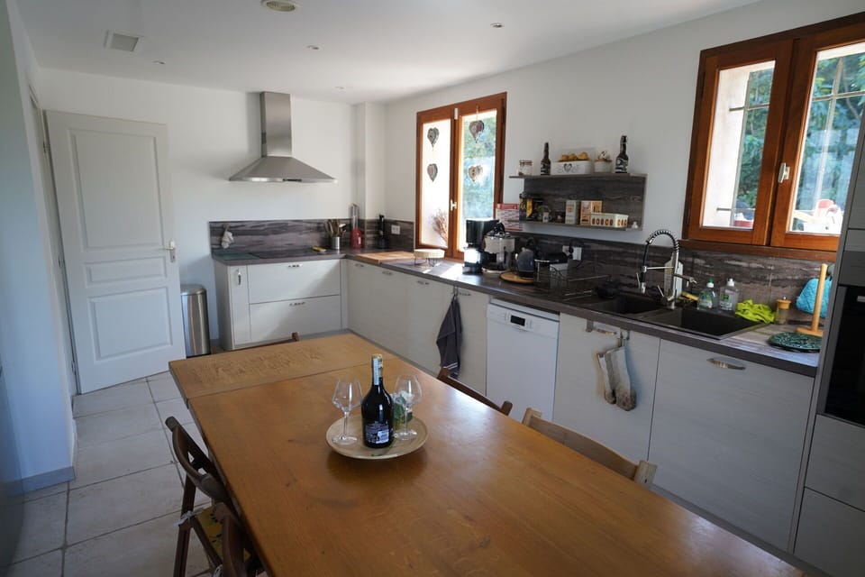 Kitchen, Countertop, Furniture, Kitchen Appliance, Cabinetry, Flooring, Wood, Interior Design, Major Appliance, Kitchen Sink