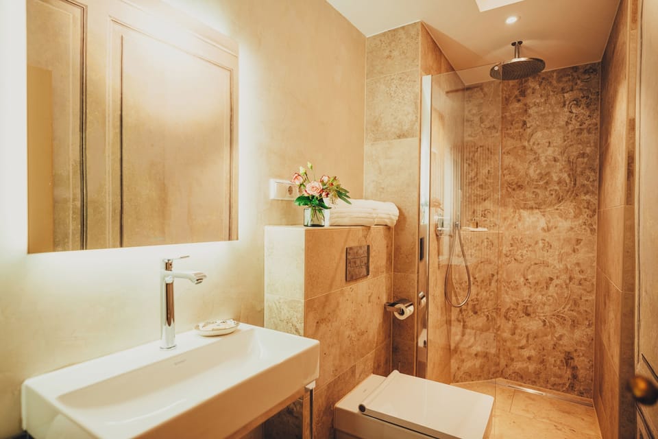 Hair dryer, towels, soap, shampoo