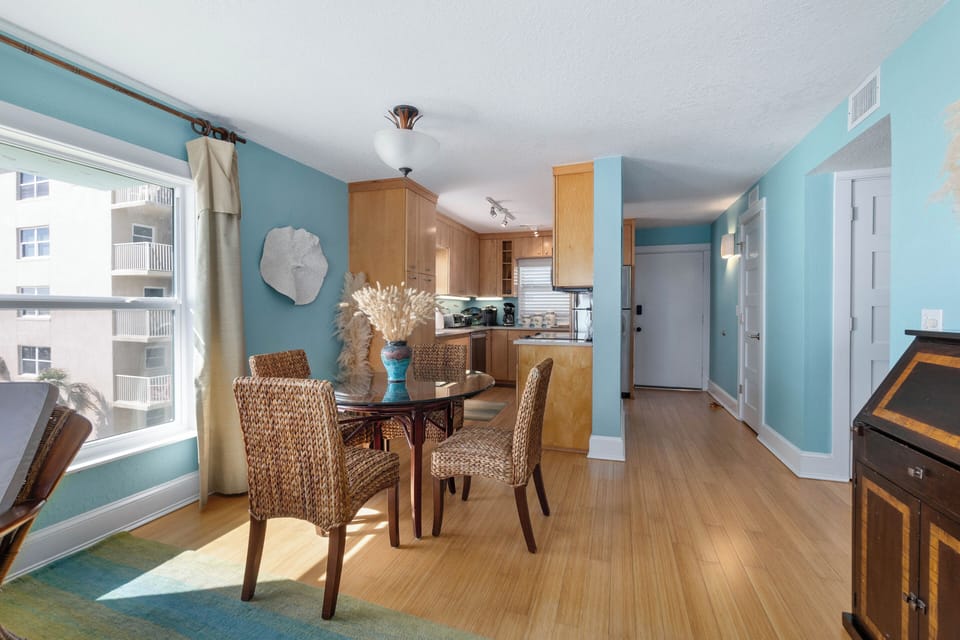 Dinette table looking into the kitchen and the front entrance door