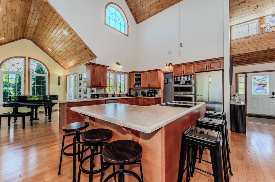 Cook, connect, and unwind in the heart of the cottage—the spacious kitchen island is perfect for preparing shared meals, hosting wine nights, or planning the next day’s outdoor excursions.