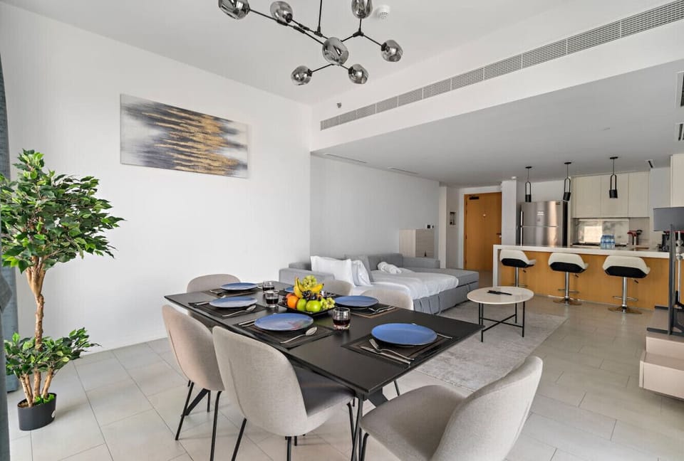 Dining and Living Area: Stylish decor with ample space for meals and relaxation! Enjoy your stay!