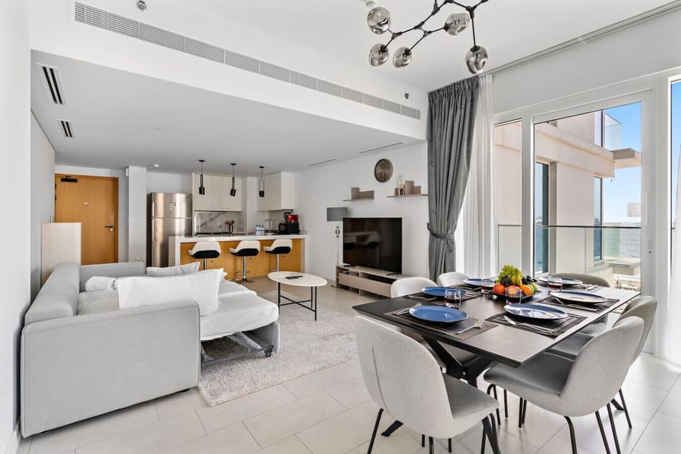 Living Room: Bright and airy with stunning views, perfect for relaxing or entertaining!