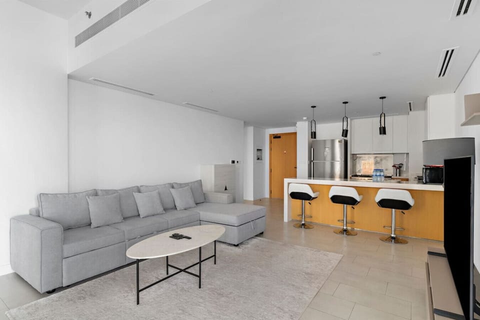 Outdoor Lounge: Unwind under elegant canopies with plush loungers and vibrant tropical vibes!
