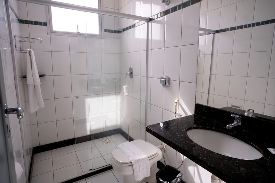 Standard Double or Twin Room | Bathroom | Shower, towels, soap, toilet paper