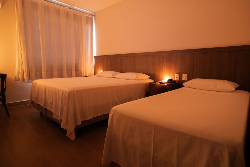 Standard Triple Room | Desk, laptop workspace, free WiFi, bed sheets