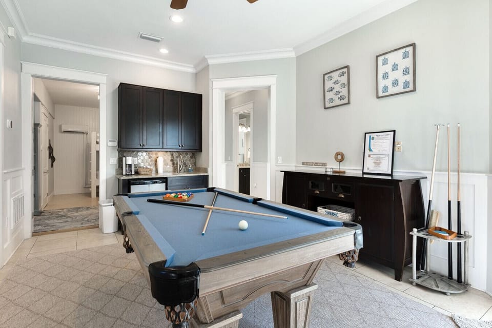 1st floor pool table, bar area, large queen bunk room