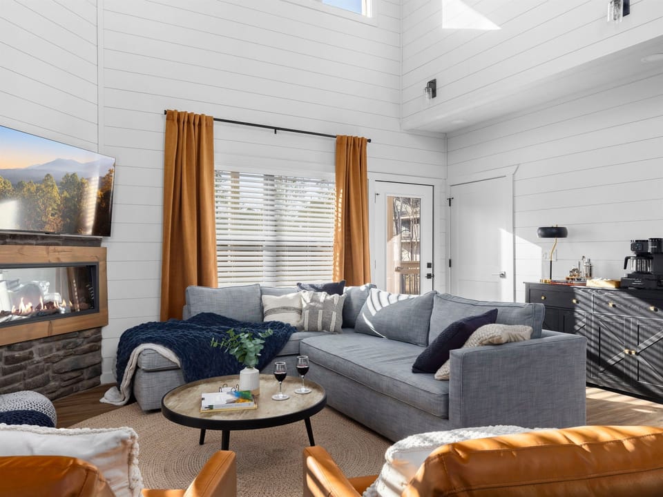 Curl up in the living area beside the electric fireplace and stream your favorite shows or movies.