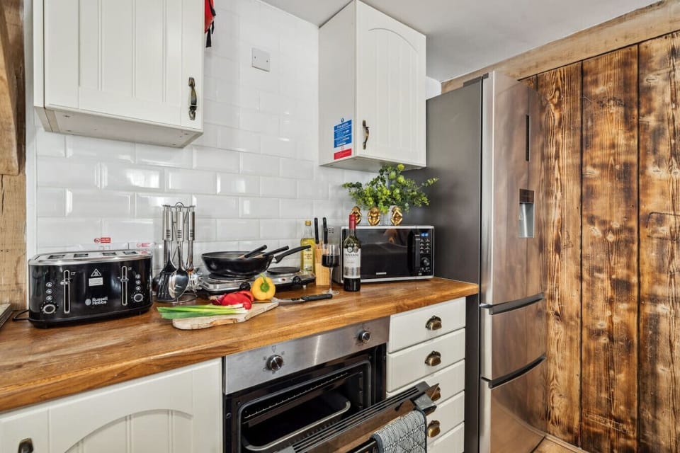 Kitchen essentials including toaster and fridge