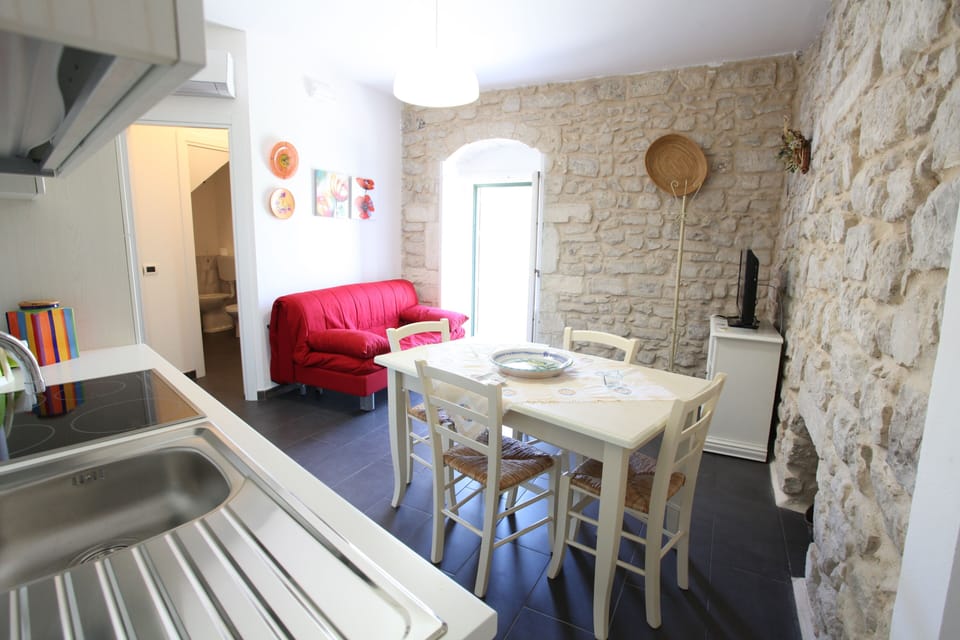 Family Apartment | Living area | Flat-screen TV